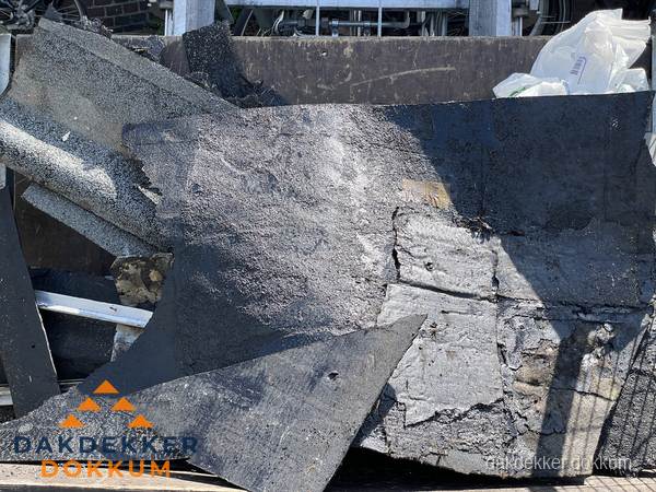 Kosten dakrenovatie: afvoer oud dakmateriaal in Dokkum